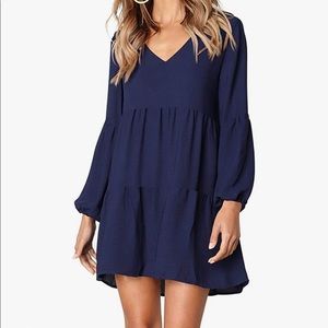 Light weight, tiered v neck dress in navy.
